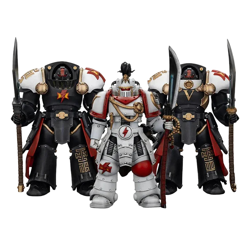 Three detailed figurines in ornate armor with weapons, featuring Joytoy and Warhammer branding.